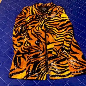 Looking for your inner Tiger?  Stunning perfect condition!